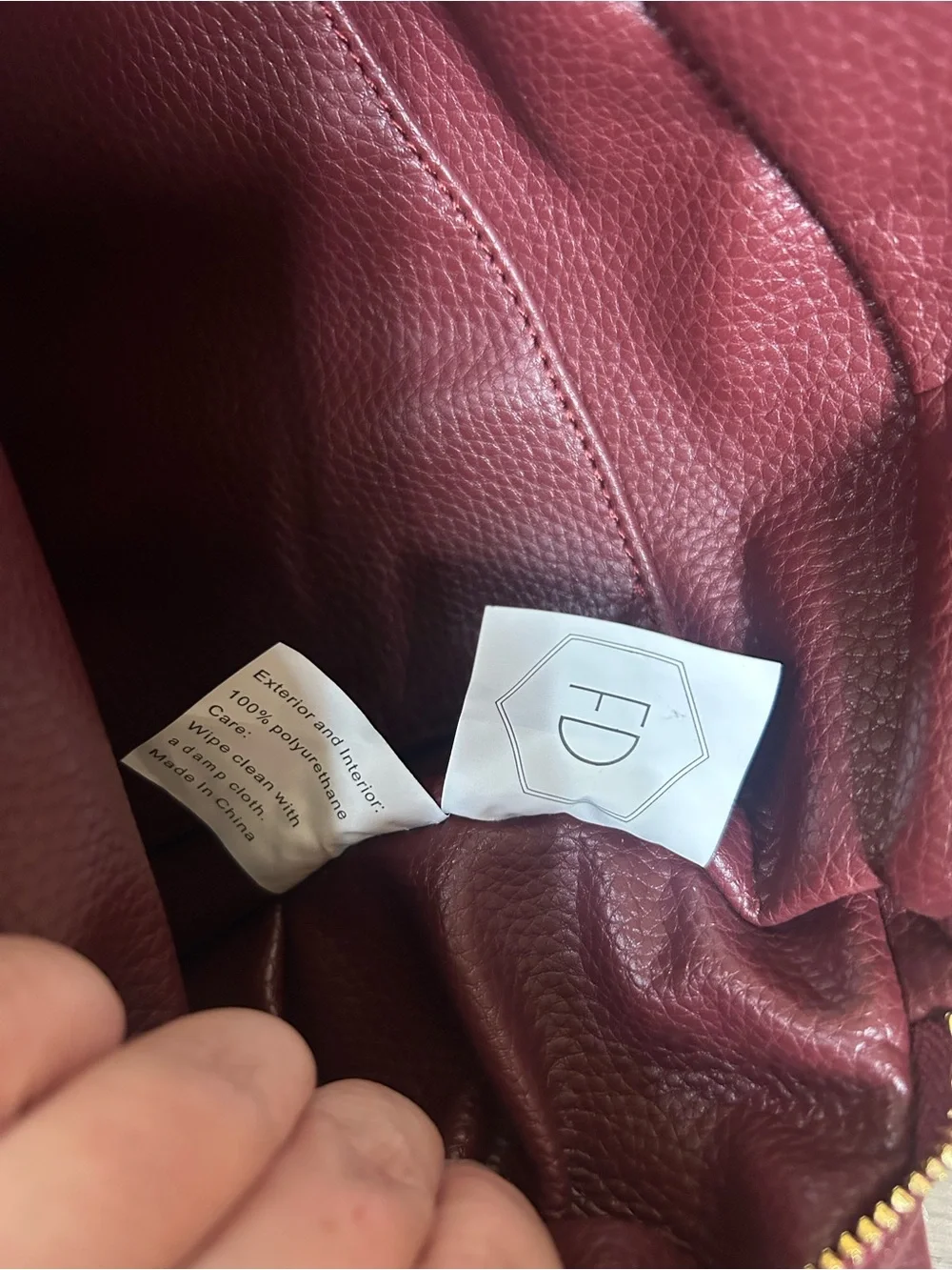 Fawn Design Pebbled Crossbody Backpack in Burgundy